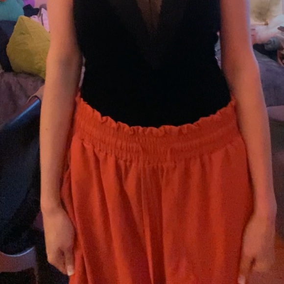 Elegant Black Top with Flowing Coral Pants - Picture 9 of 17